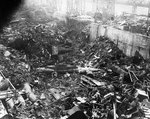 Demolished Japanese Koryu-class midget submarines among other debris at the shipyard in Kure, Japan, 14 Mar 1947