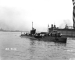 USS R-14 in port, 1941; note tug W. F. Dalzell in background