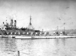 Submarine tender USS Camden with submarines R-1, R-2, R-4, R-5, R-6, R-10, R-9, R-8, R-7, R-4, S-4, and S-3, New York City, New York, United States, circa 1920, photo 2 of 2