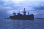 USS Sanborn (APA-193) in harbor at dawn or dusk, circa late-1944 or 1945, photo 3 of 4