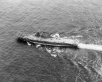 USS Saratoga underway in the Marshall Islands area, 8 Feb 1944; note SBD Dauntless and F6F Hellcat aircraft on the flight deck