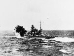 Battleship Scharnhorst firing her forward guns against HMS Glorious, in the Norwegian Sea west of Narvik, Norway, 8 Jun 1940; this photograph was taken from battleship Gneisenau