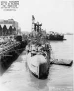 Submarine Spot at Mare Island Naval Shipyard, Vallejo, California, United States, 3 Jul 1944; note oil storage Barge YOS-1 in background