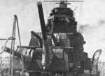 View of forward turrets and bridge of heavy cruiser Takao, 20 Mar 1932