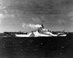 Carrier Ticonderoga at sea off the Philippine Islands, 5 Nov 1944; note camouflag pattern Measure 33 Design 10a