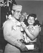 Hula dancers entertain returning Japanese-American veterans of US 442nd Regimental Combat Team aboard Victory Ship USS Waterbury Victory, Honolulu, US Territory of Hawaii, 9 Aug 1946; photo 6 of 7