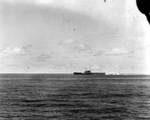 A Type 99 dive bomber attacked Yorktown, seen from cruiser Astoria, 4 Jun 1942