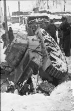 German troops recovering a Panzerkampfwagen 39H 735(f) tank that had fallen into a stream, Yugoslavia, 1941-1942, photo 1 of 2