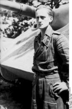 A German tank destroyer crewman posing next to his Jagdpanther, France, Jun 1944