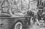 Canadian Prime Minister King and General Harry Foster walking by a Ford GPA amphibious Jeep, England, UK, 18 May 1944