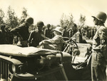 US Secretary of War Henry L. Stimson greeting a Japanese-American US Army captain of 442nd Regimental Combat Team, Route 68, north of Cecina, Italy, 6 Jul 1944