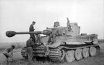 Crew of a German Tiger I heavy tank resting beside a road during Battle of Kursk, Russia, Jul 1943, photo 2 of 2