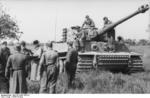 Tiger I heavy tank and crew of the German 1st SS Division Leibstandarte SS Adolf Hitler in Northern France, spring 1944, photo 1 of 2