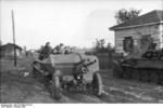 German SdKfz. 251 halftrack vehicle towing a Russian 76mm F-22 USV field gun, Russia, Oct 1943