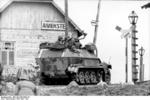 German SdKfz. 251/1 halftrack vehicle at a rail crossing, Aiviekstes, Latvia, Jun 1941