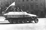 Polish resistance fighters with captured German SdKfz. 251 halftrack vehicle, Tamka Street, Warsaw, Poland, 14 Aug 1944, photo 3 of 3