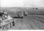 SdKfz. 250, SdKfz. 250/3, and SdKfz. 251 halftrack vehicles of the German 23rd Panzer Division on the move in Southern Russia, 21 Jun 1942