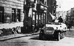 Polish resistance fighters with captured German SdKfz. 251 halftrack vehicle, Tamka Street, Warsaw, Poland, 14 Aug 1944, photo 2 of 3