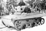 Finnish officers and men with a captured Soviet T-37A amphibious tank, Finland, 1939-1940