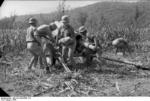 German soldiers loading a 15 cm NbW 41 rocket launcher, Italy, 1943