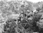 American soldier operating a M18 recoilless gun on a hill in Korea, 1950-1953