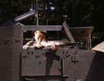 US Army soldier posing with his M1 Garand rifle next to a M3 halftrack, Fort Knox, Kentucky, United States, Jun 1942, photo 4 of 4