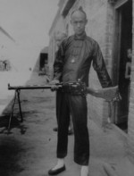 Chinese armorer with a Madsen light machine gun, 1911