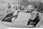 German soldier posing with a vehicle-mounted MG42 machine gun, Southern France, 1942