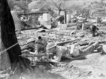 Private Aubrey Carl Kotz and Private W. Spence of 7 Platoon, A Company, Australian 2/10 Battalion during Battle of Balikpapan, Borneo, 3 Jul 1945; note PIAT