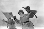 Soviet troops charging near Leningrad, Russia, 1 Jan 1943; note PPD submachine gun