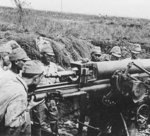 Japanese Type 88 75mm anti-aircraft gun and crew on Attu, US Territory of Alaska, May 1943