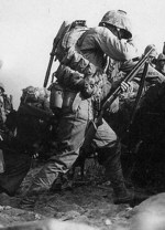 US Marine with Winchester Model 1912 shotgun on Okinawa, Japan, 1 Apr 1945