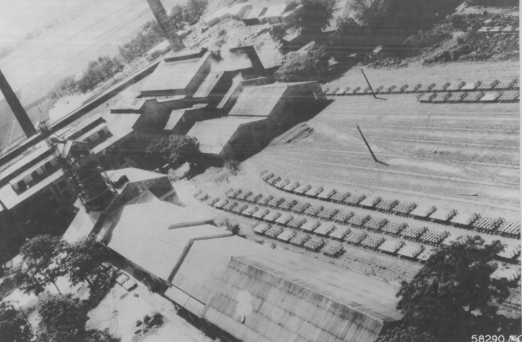 Keishu sugar plant under US aerial attack, Shoka (now Changhua), Taiwan, 17 May 1945, photo 1 of 2