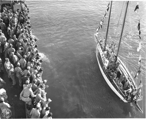 Yacht 'Lady Joe' welcoming returning Japanese-American veterans of US 442nd Regimental Combat Team aboard Victory Ship USS Waterbury Victory, Honolulu, US Territory of Hawaii, 9 Aug 1946, photo 2 of 2