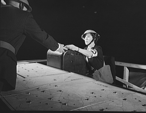 American woman working at a teletype machine, Oct 1941