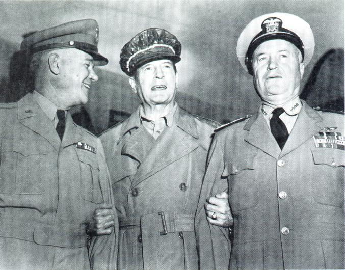 Americans General J. Lawton Collins, General Douglas MacArthur, and Admiral Forest Sherman in Korea during the planning sessions for the Inchon landings, 1950