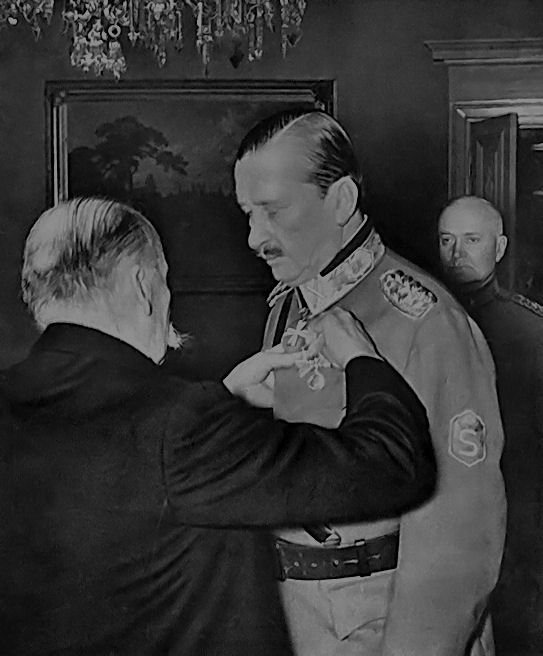 Finnish President Kyösti Kallio decorating Field Marshal Carl Gustaf Emil Mannerheim with the Order of the Cross of Liberty, Helsinki, Finland, 16 May 1940