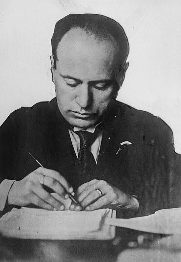 Benito Mussolini at his desk, date unknown