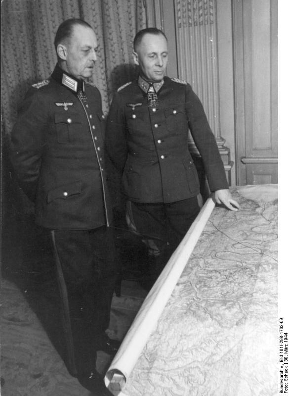 Rundstedt and Rommel studying a map at the LXXXI Army Corps headquarters in Northern France, 30 Mar 1944