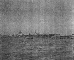 USS Anzio at anchor in the Huangpu River, Shanghai, China, Dec 1945