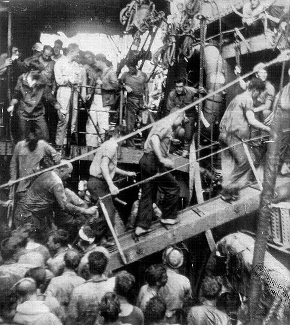 Survivors of USS Helena being transferred from destroyer USS Nicholas to cruiser USS Honolulu, Tulagi, Solomon Islands, 6 Jul 1943, photo 3 of 3