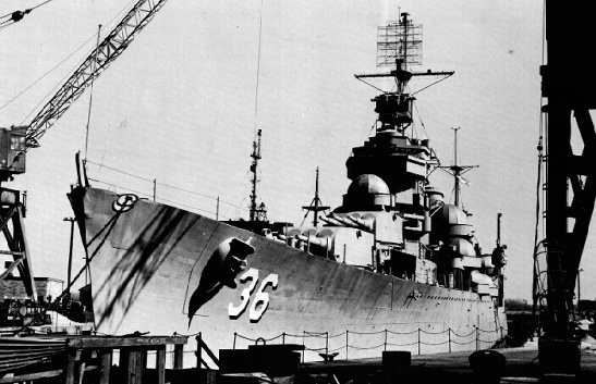 Inactive cruiser Minneapolis being overhauled at Keystone Ship Engineering and Drydock, Philadelphia, Pennsylvania, United States, spring 1955