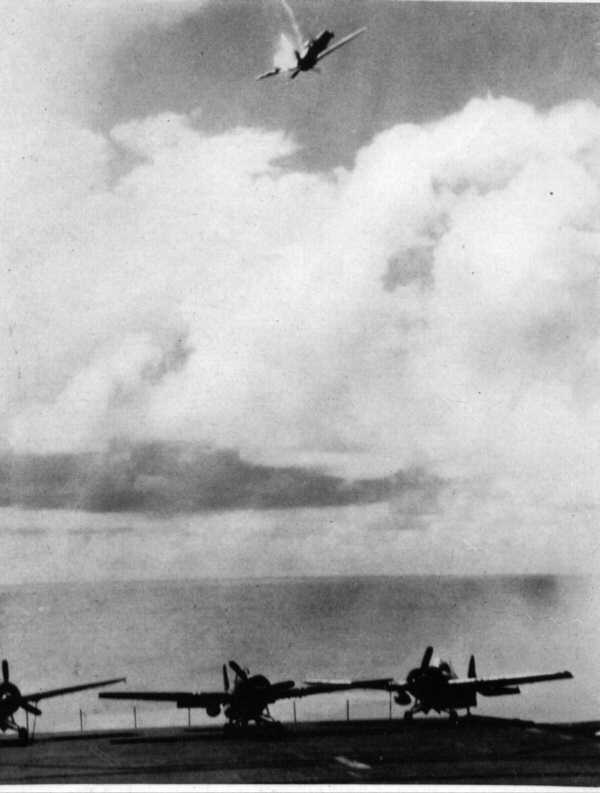 Flaming special attack plane falling astern of Petrof Bay, Philippine Islands, 26 Oct 1944