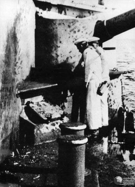 Sailors inspecting damage aboard Schleswig-Holstein caused by Polish coastal batteries of Hel Penninsula, Sep 1939