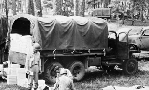 US Army CCKW 2 1/2-ton 6x6 cargo trucks in maneuvers in Louisiana, United States, 1942