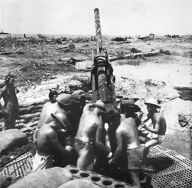 US Marines 3rd Division anti-aircraft crew performing trials with newly assigned 90mm M2 anti-aircraft guns at Cape Torokina by Empress Augusta Bay, Bougainville, Solomon Islands, circa late 1943