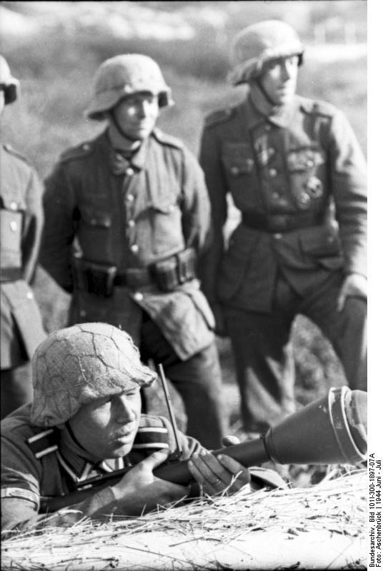 German sergeant in exercise with a Panzerfaust anti-tank weapon, France or Belgium, Jun-Jul 1944