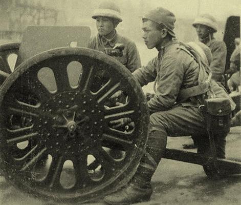 Japanese Type 94 anti-tank gun and crew in China, circa 1940s